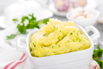 Mashed potato. Potato mash with garlic and parsley. Boiled potato. Potato puree