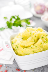 Mashed potato. Potato mash with garlic and parsley. Boiled potato. Potato puree