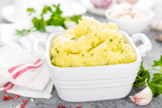 Mashed potato. Potato mash with garlic and parsley. Boiled potato. Potato puree