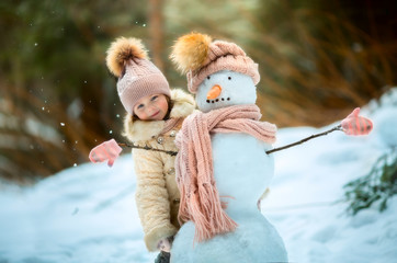 4065030 Little girl with snowman