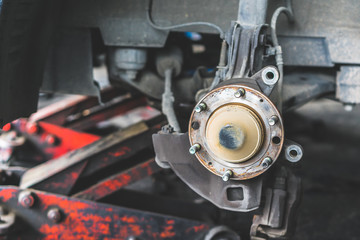 Fototapeta premium car brake repair at service station