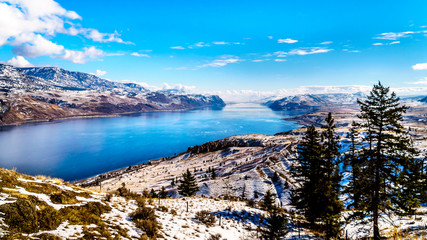 Snow Covered Mountains surrounding Kamloops Lake in central British Columbia, Canada on a cold and...