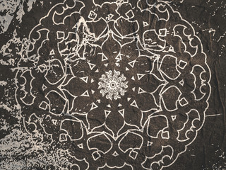 Fototapeta premium Old concrete wall surface texture. Decorative ornamental symbol. Grunge distress texture.