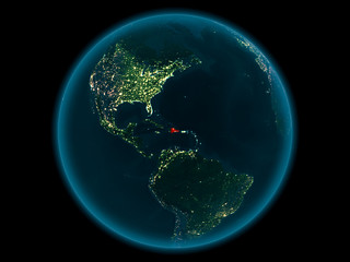 Dominican Republic on planet Earth in space at night