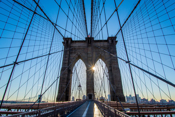 Brooklyn Bridge with sunshine peeking in.