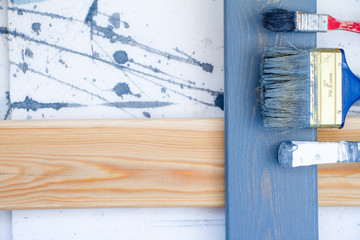 Art background. Brushes for painting on wooden canvas