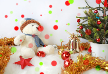 Christmas tree and decoration on white background with colorful bokeh.