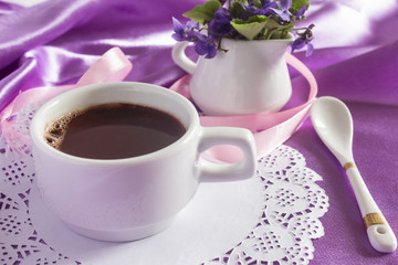 dark thick aromatic hot chocolate with a bouquet of violets
