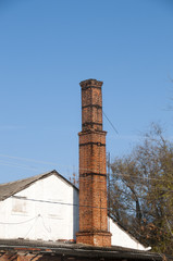 The chimney of the old red brick