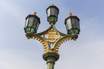 Fototapeta na wymiar Street lamp on Westminster Bridge on the background of blue sky, London, United Kingdom.
