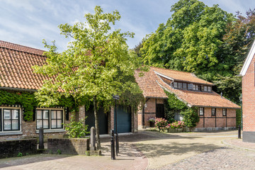 Fototapeta na wymiar Typical houses in Ootmarsum at the 'Ton Schulten Plein'. (Square), NLD