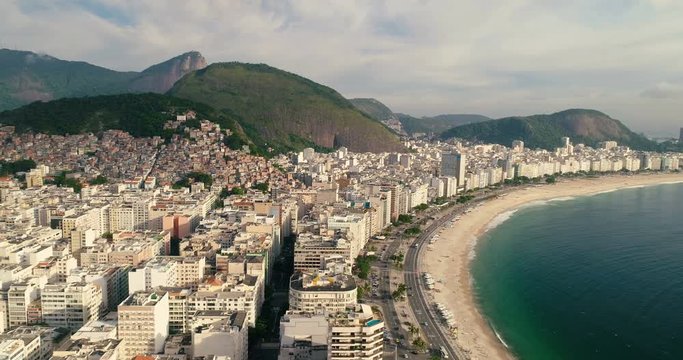 Aerial view above the city and Copacabana Beach waterfront. Rio de Janeiro, Brazil