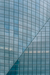 Fototapeta na wymiar Detail of glass facade in modern office building
