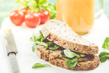 Slice of wholegrain bread with salad