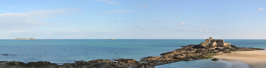 Panoramic Shot of Le Grand Be Fort in Saint Malo Bay with Quiet Sea and Blue Sky