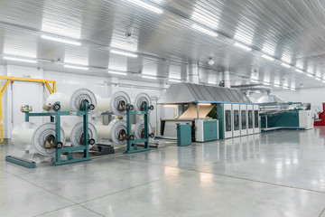 machine evaporates textile yarn. machinery and equipment in a textile factory