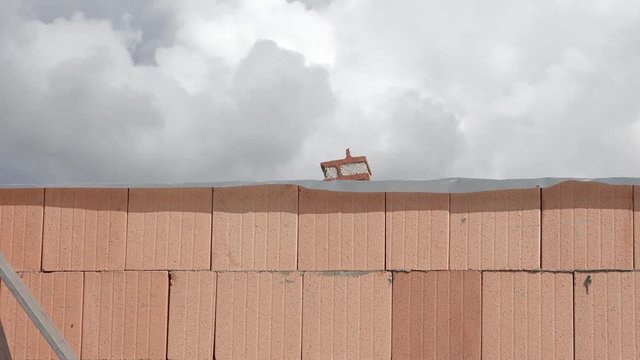 brickwork covered with foil