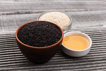 fresh sesame seeds on a rustic background