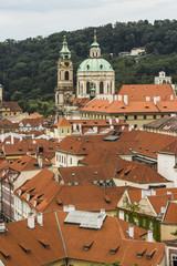 Obraz premium View of the Old Town of Prague from a high point. Red roofs, historical architecture. Czech Republic
