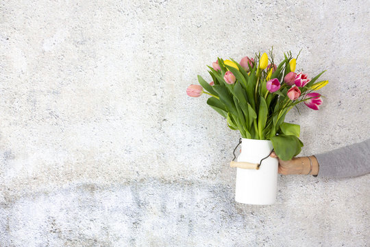 white Flower vase with colorful tulips