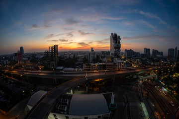 Fototapeta na wymiar Morning in Bangkok Sky with office building and traffic road