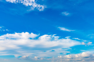 Naklejka na ściany i meble Blue sky background with tiny clouds on season summer.