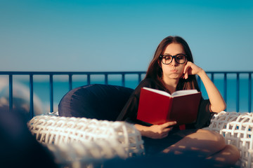 Summer Woman Reading a Book by the Beach on Holiday