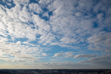 Naklejka na ściany i meble cityscape view. cloudy day. city horizon line with clouds. copy space.