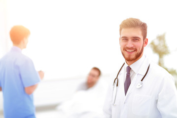 smiling doctor on blurred background