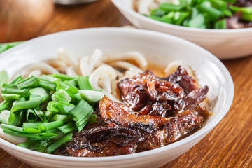 Japanese Udon noodles with beef, green onion and soup