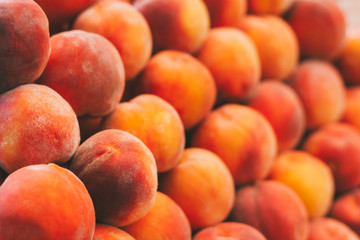 Peaches Fruits Background In The Grocery Market. Healthy And Tasty