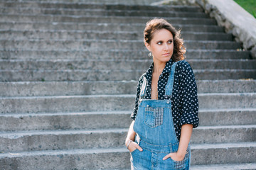 Fototapeta premium Beautiful Portrait Of Pretty Young Caucasian Woman Wear In Denim