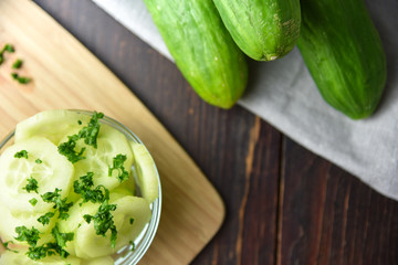 Salad of cucumber in glas bowl fresh food