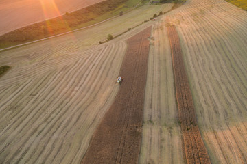 aerial photo of working combine