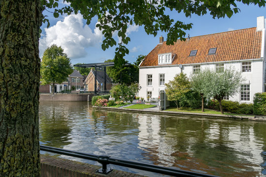 Cityscape of Sneek at 2e Oosterkade at Looxmagracht (Looxma canal) with the  'Laatste stuver brug' (last penny bridge) from 1887 in the province Friesland, The Netherlands