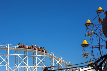 Scenic railway rides at historic amusement park melbourne australia against blue sky