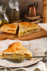 slices of homemade potato pie on pink plate