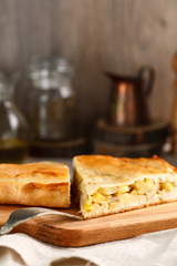 slices of homemade potato pie on cutting board