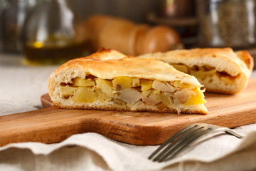 slices of homemade potato pie on cutting board