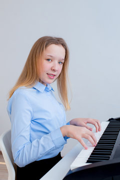 Girl playing synthesizer