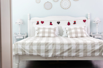 Picture of comfortable double bed in bedroom