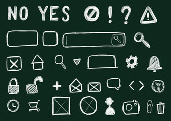 Hand drawn symbols and icons for web prototypes on chalkboard