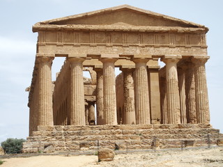 Front of ancient greek temple of Concordia in Valley of the Temples in site of Agrigento city at...