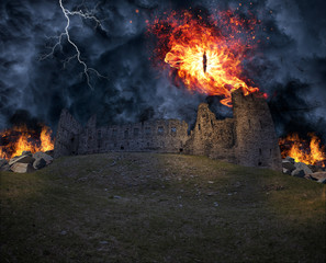 Epic manipulation with a burning demon eye flying over a castle ruin in a stormy night. Shot was...