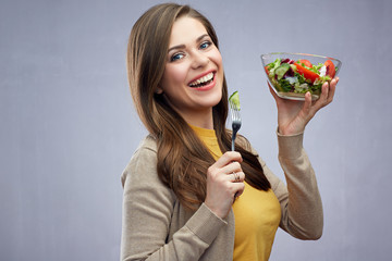 Happy woman eating healthy salad food.