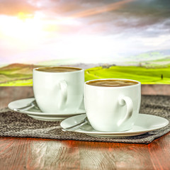 Coffee and tuscany landscape 