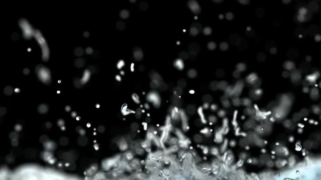 Screen is being filled with the pouring water 3D slow motion animation with alpha matte, very shallow depth of field