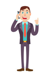 Businessman talking on mobile phone and pointing up