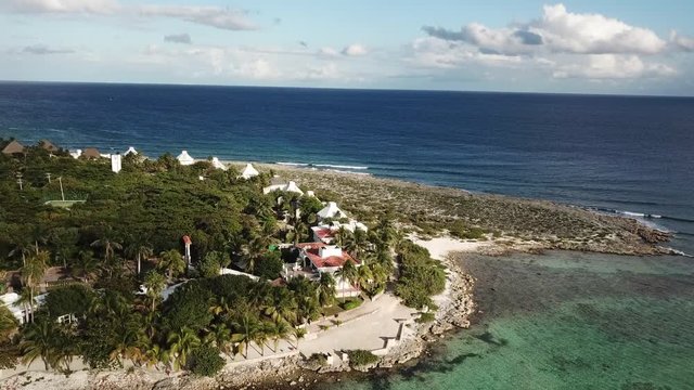 Akumal bay Caribbean beach in Riviera Maya. Aerial view of Sea side beach. Top view aerial video of beauty nature landscape with tropical beach in Akumal, Mexico. Caribbean Sea, coral reef, top view