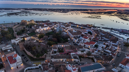 Aerial. Delightful sunrise above the old town of Faro Portugal.